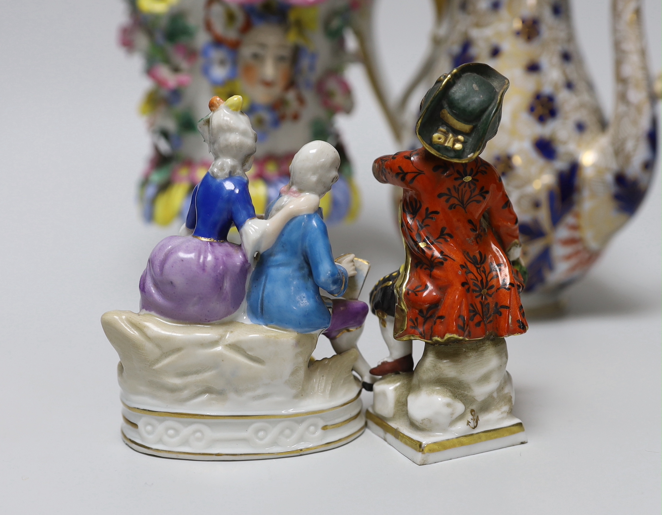 A 19th century German figure of a girl, 19cm, Vienna-type female figure, German figure of a boy and similar figure group, a continental coffee pot and an encrusted vase, the largest 18cm high